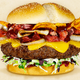 Illustration for article titled 10 mouthwatering cheeseburgers inspired by 10 American cities